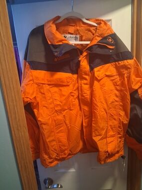 Columbia Bright Orange & Black Jacket Small Ink Mark On Back Nwt